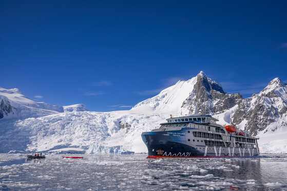 Antarctica21 expedition ship sailing among Antarctic ice