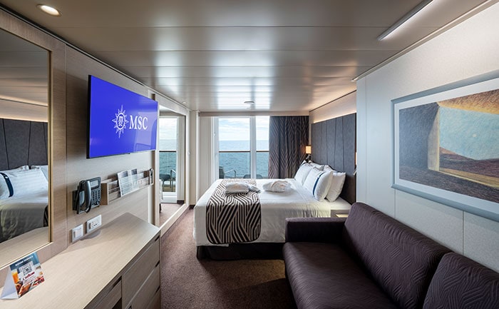 Каюта Deluxe Balcony Aurea на борту MSC World Europa