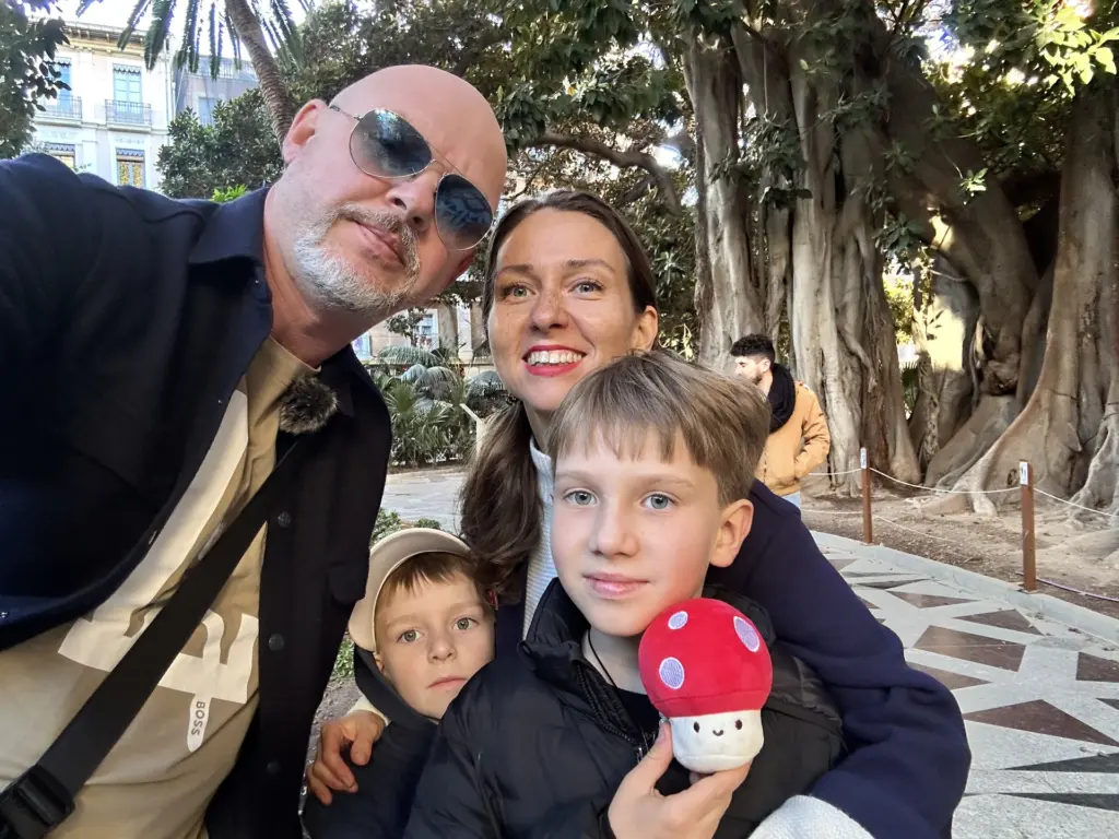 Family walking through a city park