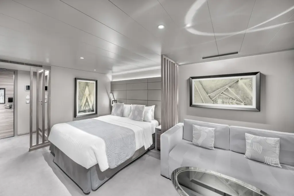 MSC ship cabin with a double bed and sofa